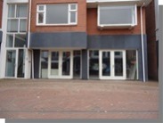 foto nieuwe puien en gevelbekleding winkel te Haren